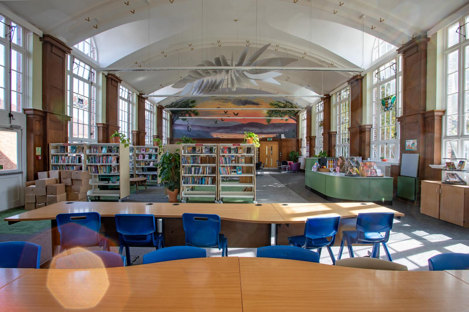 Refurbished library with arched ceiling and new furniture